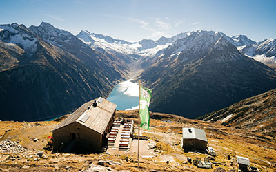Breathtaking panoramic view on the Olperer mountain hut. Valley